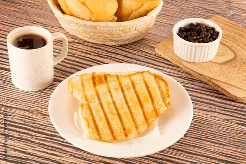 Delicious toasted bread with melted butter, Brazilian breakfast