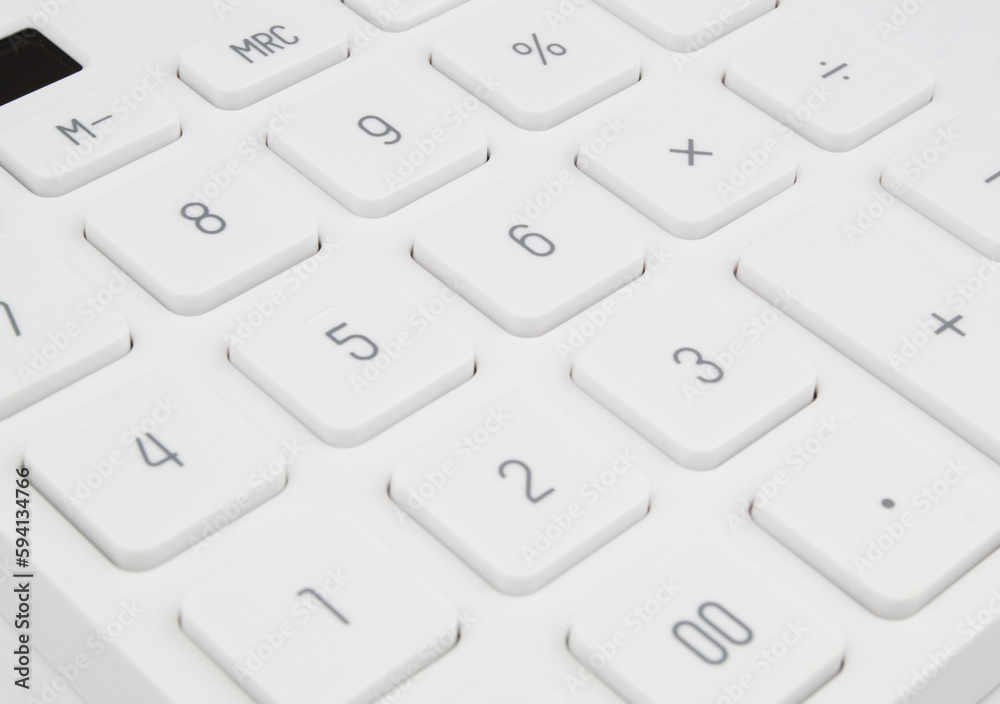 Close-up of new white calculator keys.