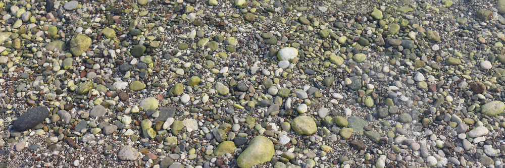 Smooth round sea beach pebbles texture background Smooth round sea beach pebbles texture background