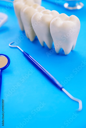 Dental model and dental equipment on blue background, concept image of dental background. 