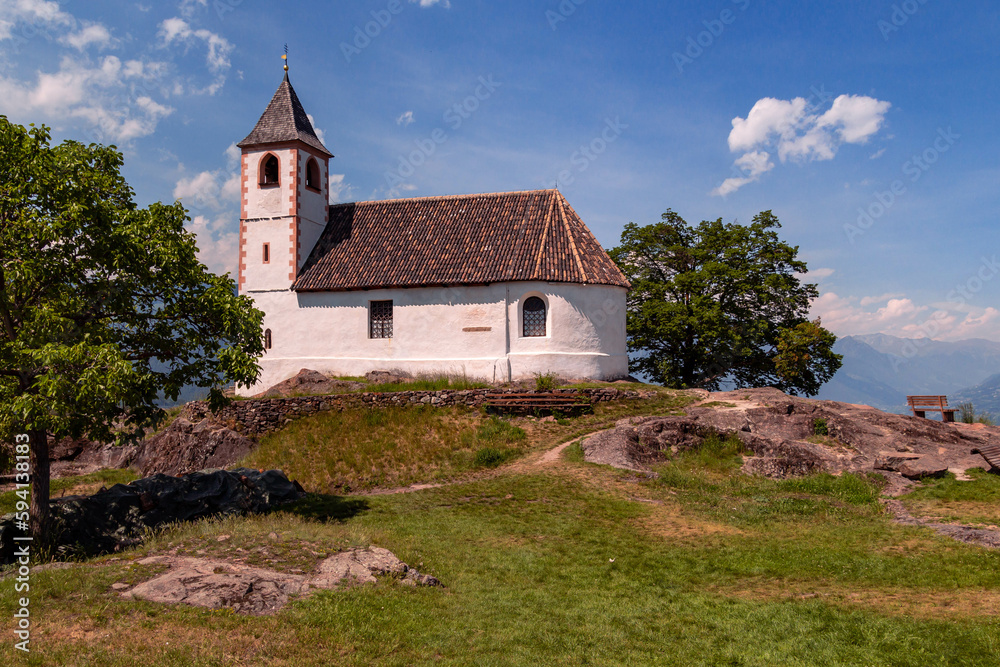 The little Church St. Hippolyt located near Tisens, South Tyrol The little Church St. Hippolyt located near Tisens, South Tyrol
