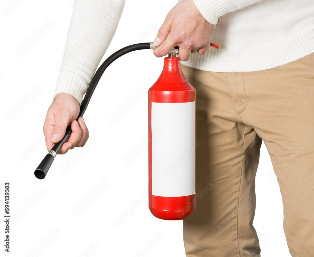 Naklejka premium Man using fire extinguisher against grey background