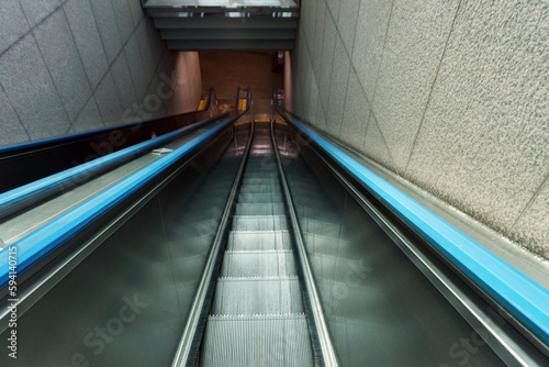 Stainless steel escalator in subway station, closeup of photo                             