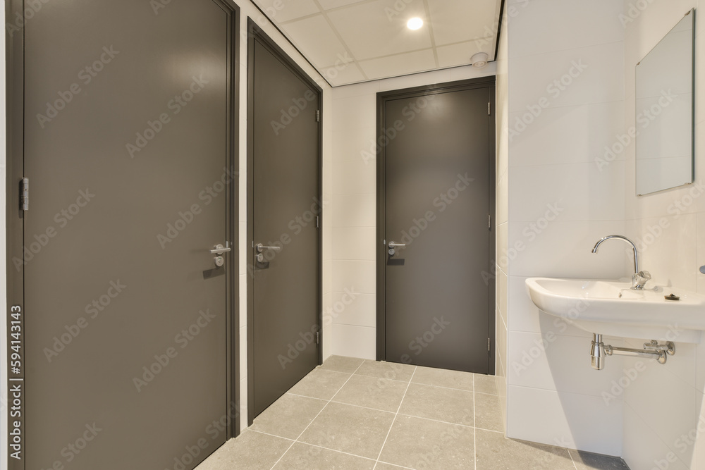 a bathroom with two sinks and a mirror on the wall next to each other areas in the room is very clean a bathroom with two sinks and a mirror on the wall next to each other areas in the room is very clean