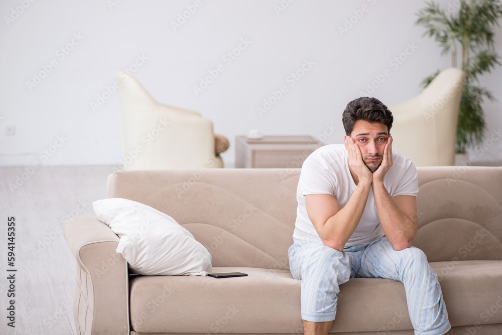 Young man starting day at home Young man starting day at home