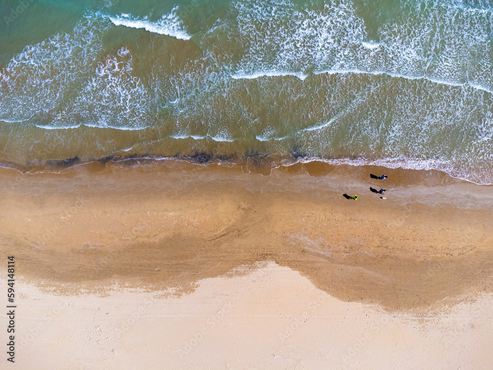 Aerial view landscape Italy Pescara. Empty beach and sea, waves, sand. Photo from a drone.