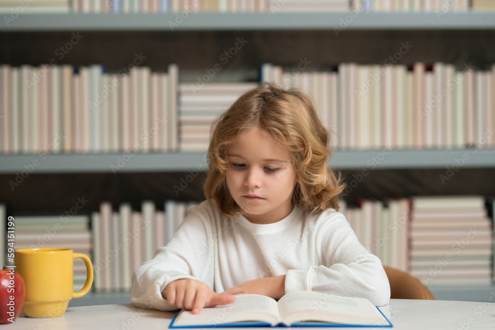 Intellectual child, clever pupil. Little student on school library. Child reading book at school. Nerd pupil studying at school. Clever intelligent schoolboy overwork. Intellectual child, clever pupil. Little student on school library. Child reading book at school. Nerd pupil studying at school. Clever intelligent schoolboy overwork.