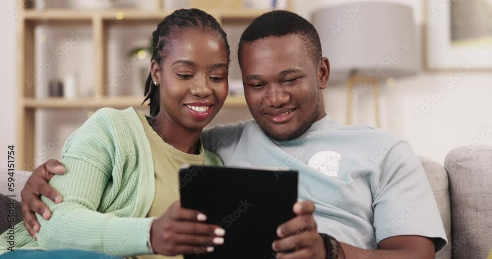 Digital tablet, love and happy couple on a sofa for streaming, subscription and entertainment in their home. Online, browsing and man with woman on a couch smile, laughing and watching movie or meme Digital tablet, love and happy couple on a sofa for streaming, subscription and entertainment in their home. Online, browsing and man with woman on a couch smile, laughing and watching movie or meme