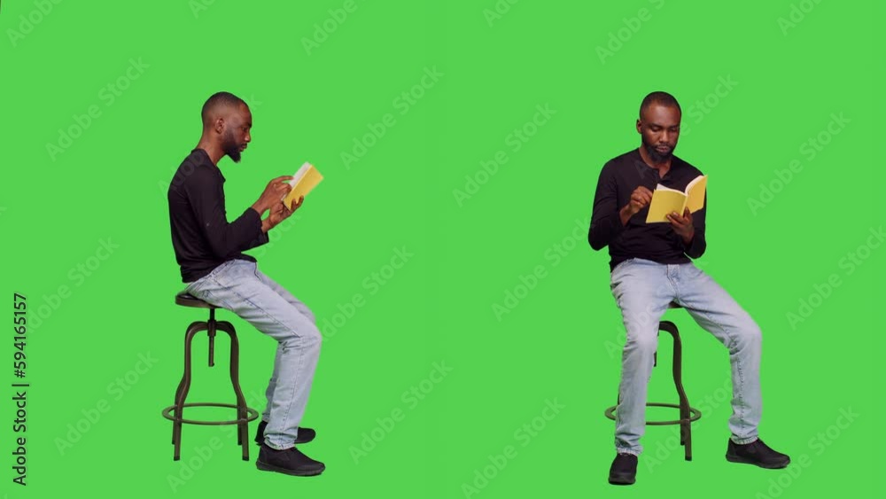 Focused person reading story tale book in studio, sitting on chair over full body greenscreen. Young optimistic man enjoying novel lecture on camera, leisure activity with literature. Focused person reading story tale book in studio, sitting on chair over full body greenscreen. Young optimistic man enjoying novel lecture on camera, leisure activity with literature.