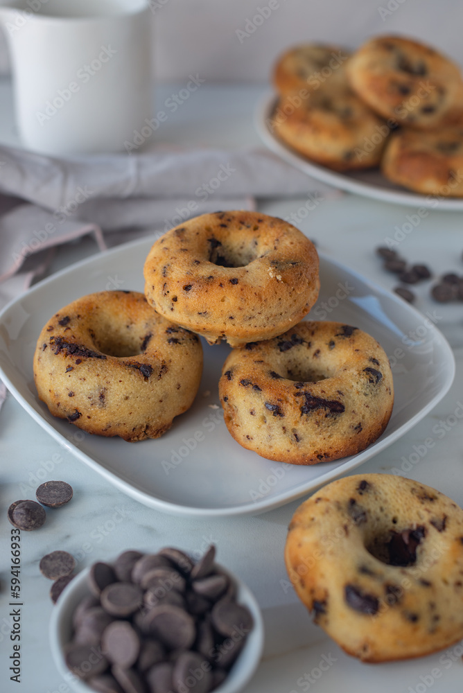 sweet home made chocolate chip donuts on a table