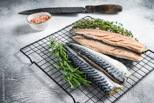 Fresh sliced mackerel fillet fish. White background. Top view