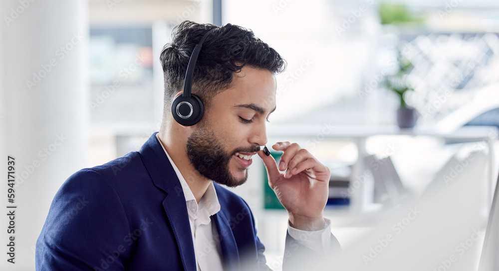 Customer service, support and communication with a consultant man using a headset while working in an office. Contact us, crm and consulting with a happy young male employee at work in a call center Customer service, support and communication with a consultant man using a headset while working in an office. Contact us, crm and consulting with a happy young male employee at work in a call center