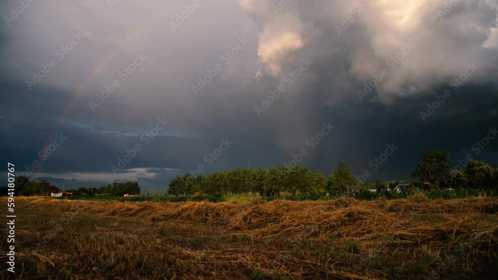Dramatic storm over summer field
