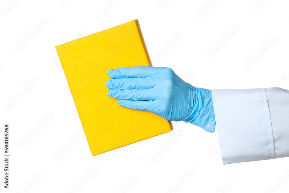 Doctors hand in glove holds book, isolated on white background Doctors hand in glove holds book, isolated on white background