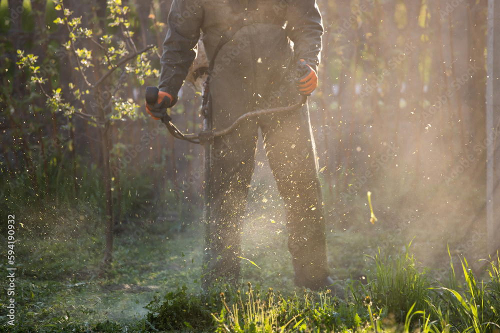 Naklejka premium Lawn mover on green grass. Machine for cutting lawns.