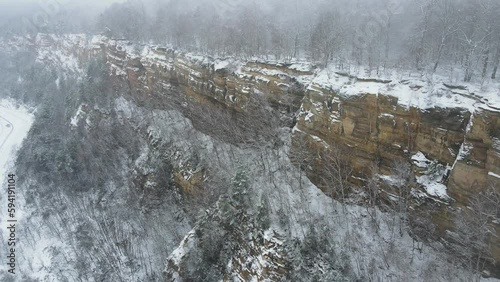 Drone shot Barrois quarry in France. Winter nature with snow and tree photo