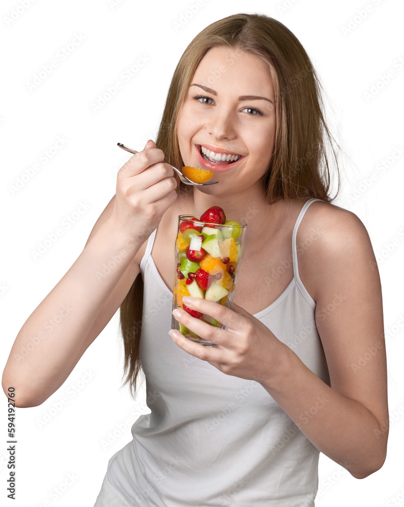 Young cute woman eat fruits isolated on white background Young cute woman eat fruits isolated on white background