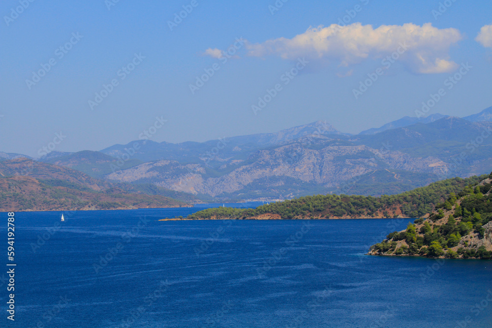 Fethiye Butterfly Valley, yachts are vacationing around the island.