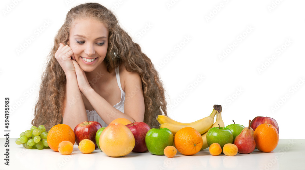 Attractive young woman enjoying fruits on breakfast Attractive young woman enjoying fruits on breakfast