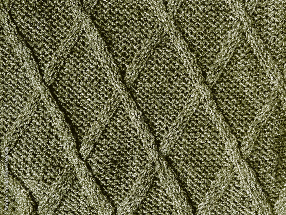 Handmade knit material with macro woven threads.