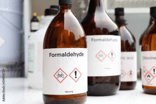 Formaldehyde, Hazardous chemicals and symbols on containers photo