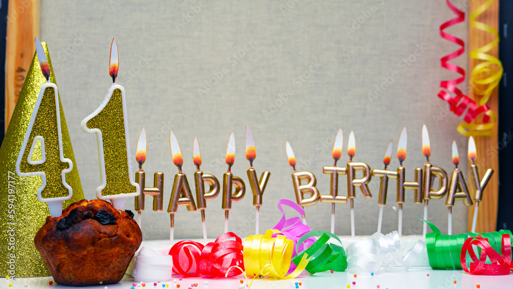 Happy birthday background with golden candles and decorations with