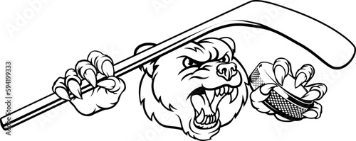 A bear ice hockey player animal sports mascot holding a hockey stick and puck