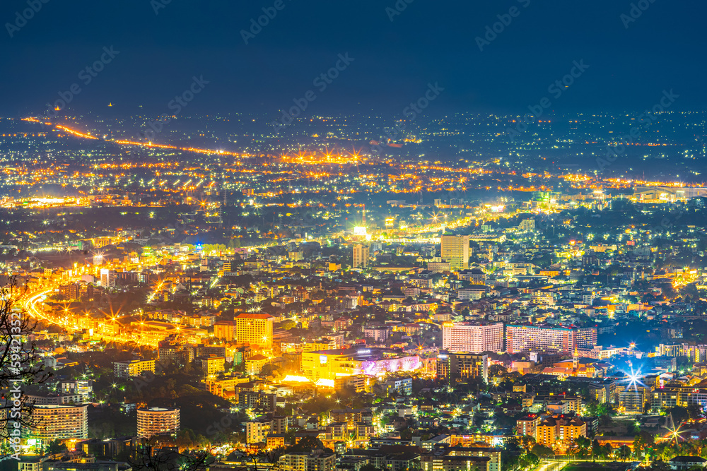 Obraz premium CHIANG MAI, THAILAND - May 3, 2020:Beautiful of Landscape View cityscape over The color of the lights and city center of Chiang mai,Thailand at twilight night background.