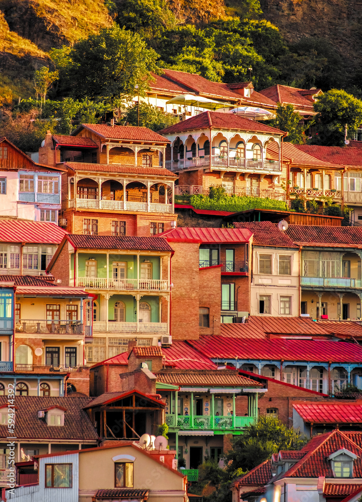 Colorful traditional houses with wooden carved balconies in the Old Town of Tbilisi, Georgia.