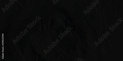 The texture of Black crumpled paper. Crumpled Black paper texture background. 