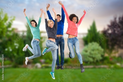 Diverse group of happy young friends have fun