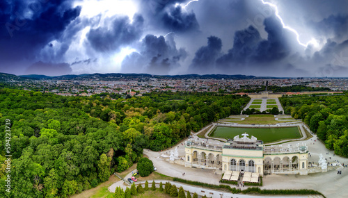 Schonbrunn Palace aerial panoramic view during a storm in Vienna, Austria. Schloss Schoenbrunn is an imperial summer residence photo