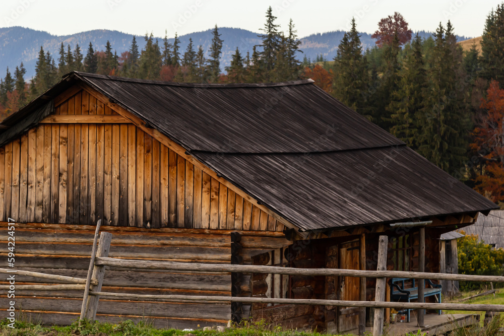 Traditional wooden mountain hut, farm building in the Ukrainian Carpathians Traditional wooden mountain hut, farm building in the Ukrainian Carpathians