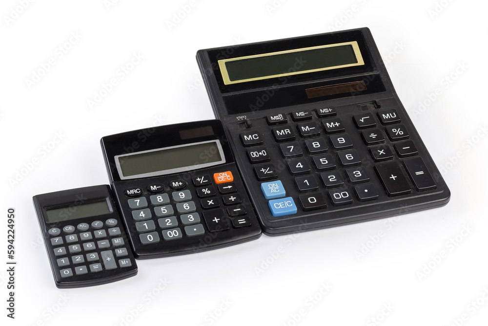 Different electronic calculators laid out in row on white background Different electronic calculators laid out in row on white background