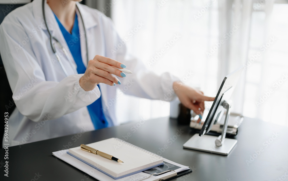Medical technology concept. Doctor working with mobile phone and stethoscope in modern office Medical technology concept. Doctor working with mobile phone and stethoscope in modern office