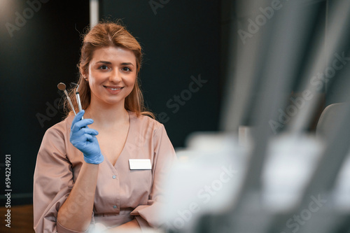 Photos Portrait of female doctor. In the stomatological cabinet