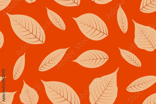 Seamless pattern of autumn leaves with an orange background. Nature motif. Can be used for fabric,fashion,cloth,textile,wrapping,covers,decor.