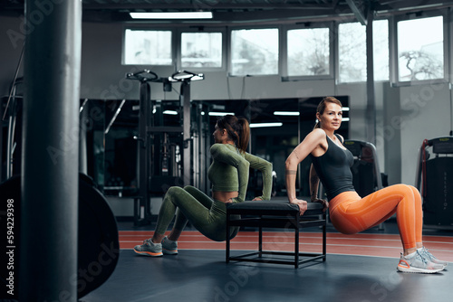 Pretty women working out in a gym.