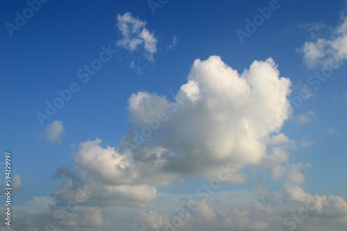 white fluffy clouds in the blue sky