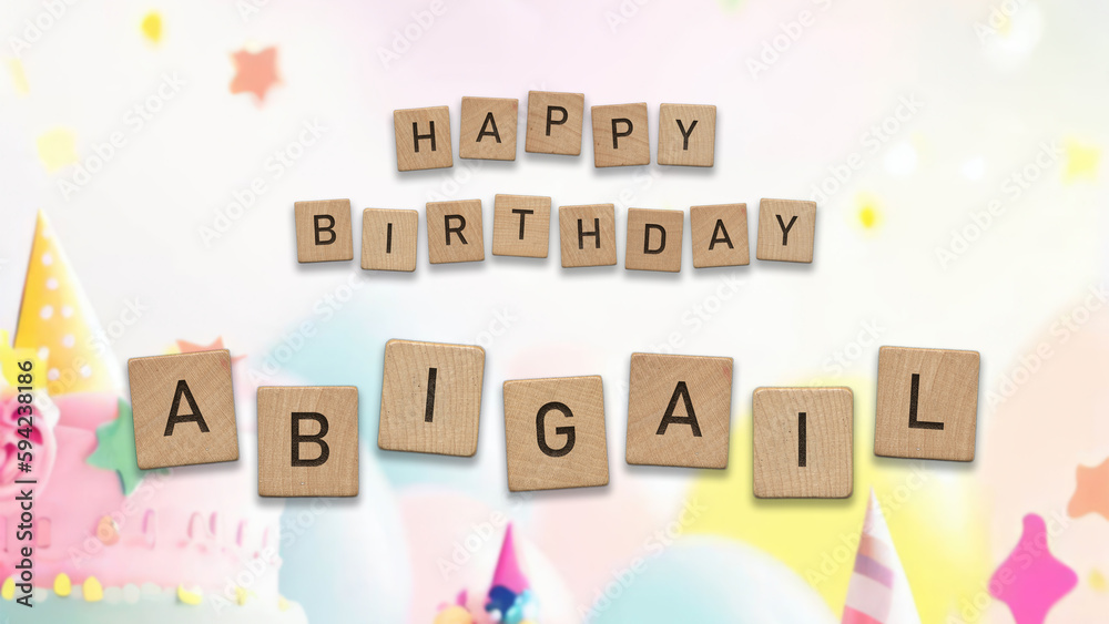 Happy Birthday Abigail card with wooden tiles text. Girls birthday card