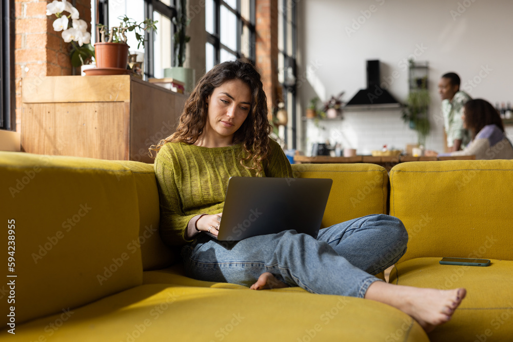 Female student using a laptop for study at home Female student using a laptop for study at home
