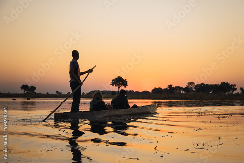 Fototapeta Naklejka Na Ścianę i Meble -  mokoro at sunset