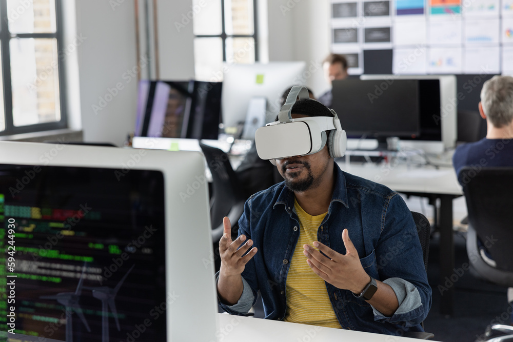 Businessman in an office having a meeting in the metaverse