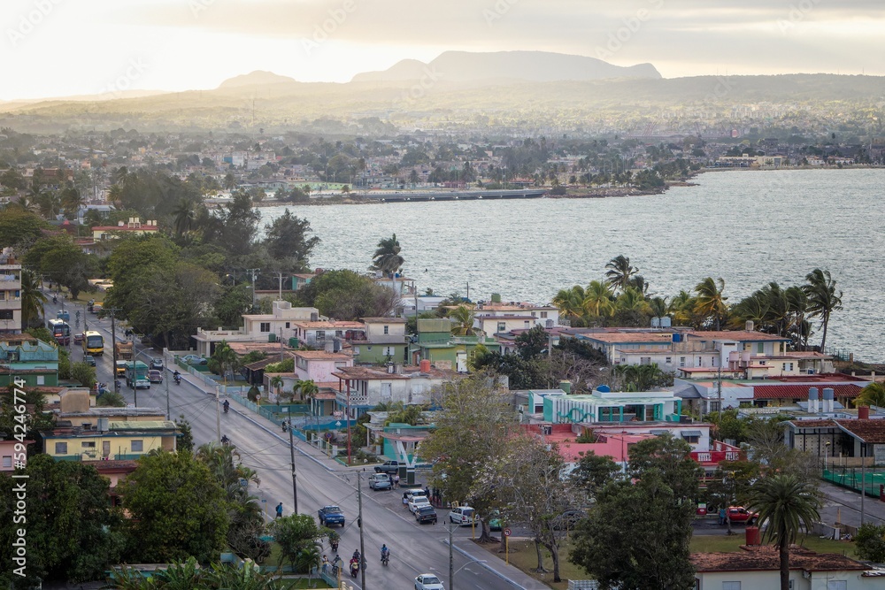 Aerial shot of the India Dormida mountains and Matanzas city in Cuba under the sunset sky