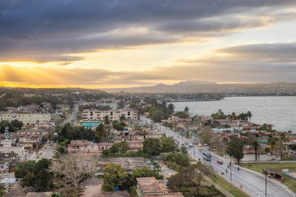 Aerial shot of the India Dormida mountains and Matanzas city in Cuba under the sunset sky