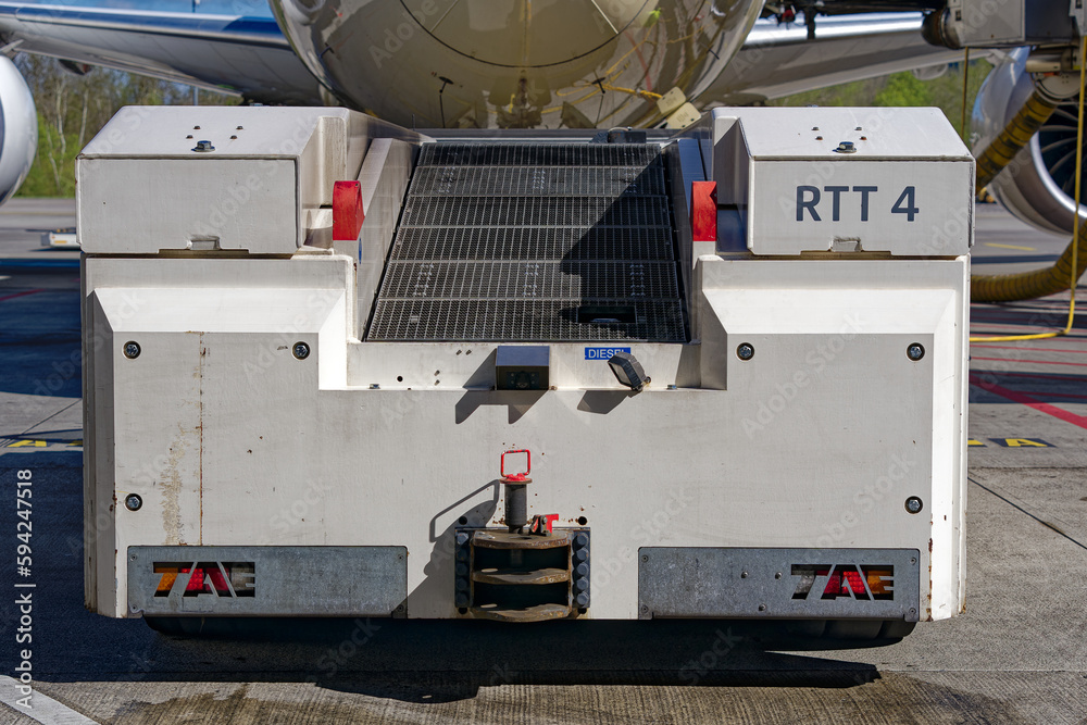 Rear view of tail lights with orange blinker of Trepel tractor at Swiss