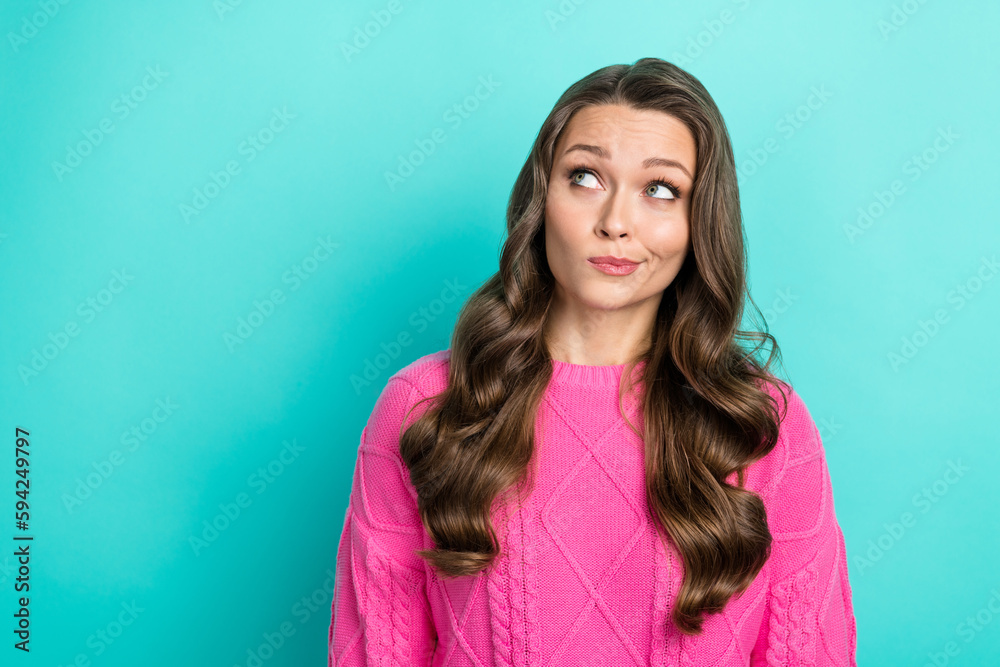 Fototapeta premium Photo of thoughtful intelligent woman with wavy hairdo dressed knitwear sweater look empty space isolated on teal color background