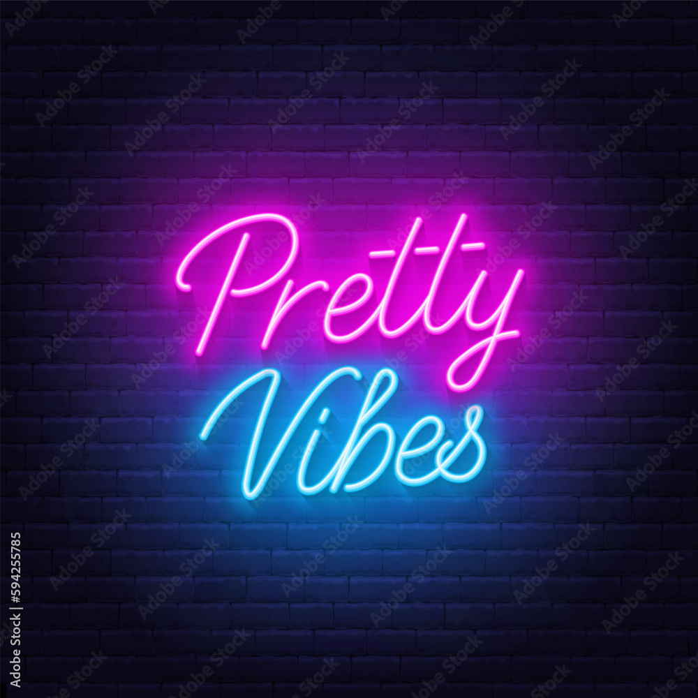 Pretty Vibes neon lettering on brick wall background.