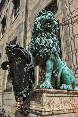 Bavarian lion statue at Munich Alte Residenz palace in Odeonplatz. Munich, Bavaria, Germany photo