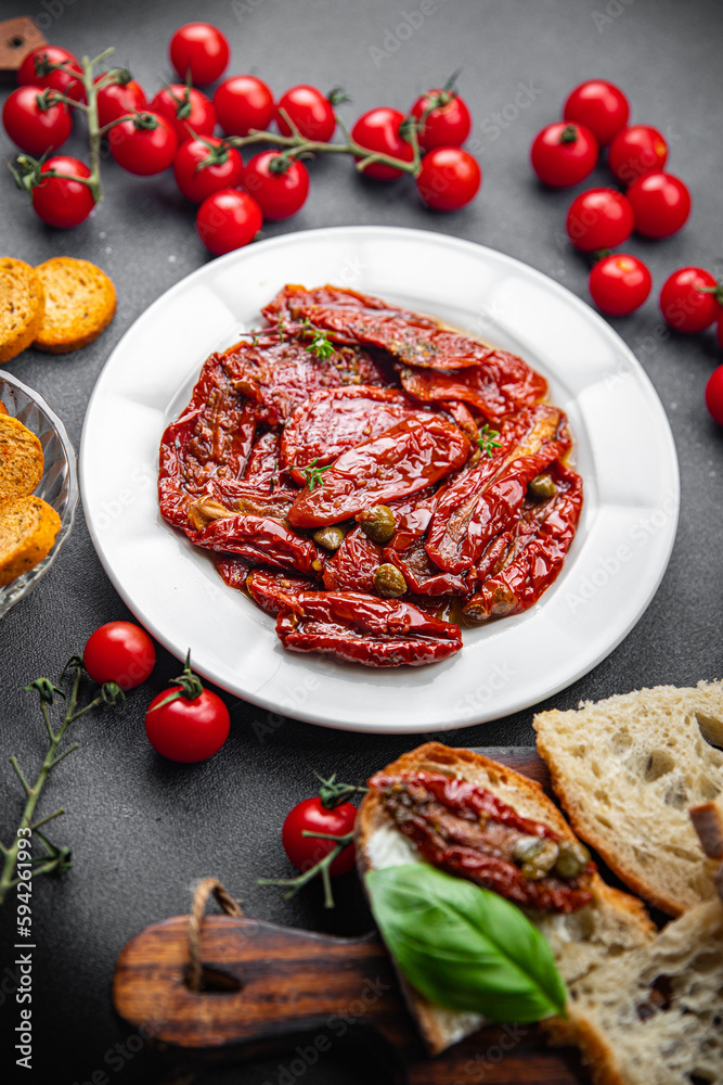 sun dried tomato vegetable appetizer healthy meal food snack on the table copy space food background rustic top view keto or paleo diet veggie vegan or vegetarian food sun dried tomato vegetable appetizer healthy meal food snack on the table copy space food background rustic top view keto or paleo diet veggie vegan or vegetarian food